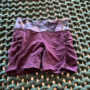 Lululemon speed track shorts in dark purple.